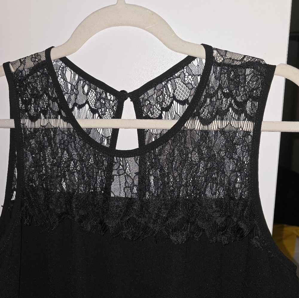 Black jumper with lace.